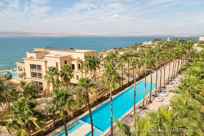 Pool and palm trees at a resort beside the Dead Sea, an enjoyable place to include on a Jordan itinerary.